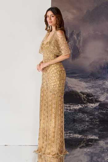 Geisha Designs Gold Viscose, Nylon Sequins, Beads, Fringe Susanna Embellished Gown With Cape at Aza Fashions Geisha Designs_Gold Viscose, Nylon Sequins, Beads, Fringe Susanna Embellished Gown With Cape _at_Aza_Fashions