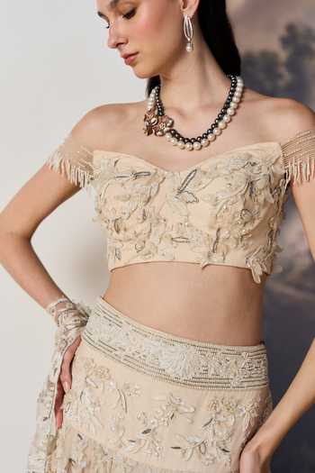 Geisha Designs Beige Viscose, Polyester, Nylon Sweetheart Neck Aurelie Emdroidered Lehenga Set at Aza Fashions Geisha Designs_Beige Viscose, Polyester, Nylon Sweetheart Neck Aurelie Emdroidered Lehenga Set _at_Aza_Fashions