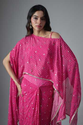 Buy Krishna Padia Pink Chinon One Shoulder Bandhej Print Cape And Skirt Set Online at Aza Fashions Buy_Krishna Padia_Pink Chinon One Shoulder Bandhej Print Cape And Skirt Set _Online_at_Aza_Fashions