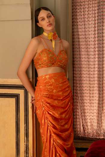Névoh Orange Sweetheart Neck Bead Embellished Bustier And Ruffle Skirt Set Online at Aza Fashions Névoh_Orange Sweetheart Neck Bead Embellished Bustier And Ruffle Skirt Set _Online_at_Aza_Fashions