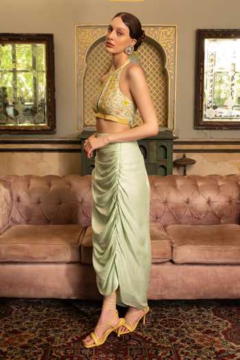 Névoh Green Silk, Dupion Halter Neck, Keyhole Gold Leaf Embroidered Top And Skirt Set at Aza Fashions Névoh_Green Silk, Dupion Halter Neck, Keyhole Gold Leaf Embroidered Top And Skirt Set _at_Aza_Fashions