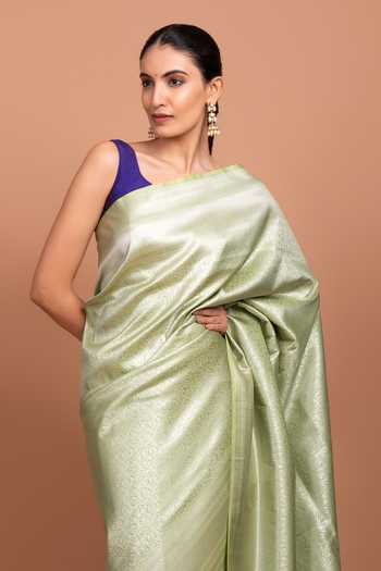 Devissha Green Silk Floral Jaal Woven Saree Online at Aza Fashions Devissha_Green Silk Floral Jaal Woven Saree _Online_at_Aza_Fashions