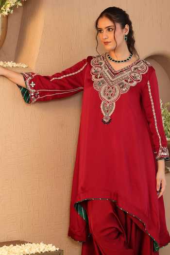 Roohbyridhimaa Red Silk Satin V-neck Ruby Kurta And Draped Pant Co-ord Set at Aza Fashions Roohbyridhimaa_Red Silk Satin V-neck Ruby Kurta And Draped Pant Co-ord Set _at_Aza_Fashions