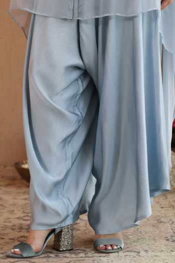 Shop Roohbyridhimaa Blue Silk Satin, Chiffon V-neck Powder Era Cape And Draped Pant Co-ord Set Online at Aza Fashions Shop_Roohbyridhimaa_Blue Silk Satin, Chiffon V-neck Powder Era Cape And Draped Pant Co-ord Set _Online_at_Aza_Fashions