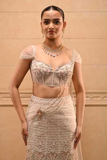 Tarun Tahiliani_Ivory Tulle Sequins, Pearls, Cut Work Sweetheart Basra Concept Saree With Blouse _Online_at_Aza_Fashions
