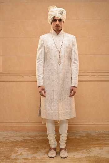 Tarun Tahiliani_Ivory Georgette, Jacquard, Poplin Brooches Chikankari Embroidered Sherwani Set _at_Aza_Fashions