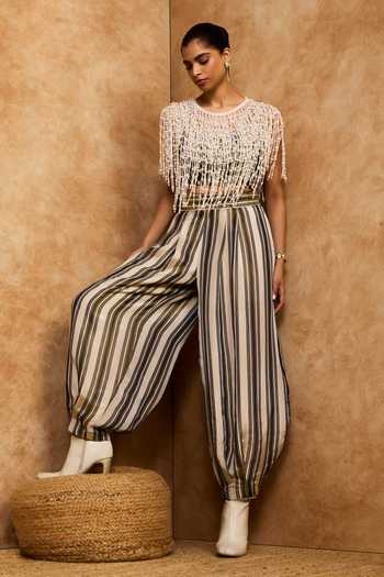 Buy Needleten Olive Green Silk, Tissue Striped Barrel Pant at Aza Fashions Buy_Needleten_Olive Green Silk, Tissue Striped Barrel Pant _at_Aza_Fashions
