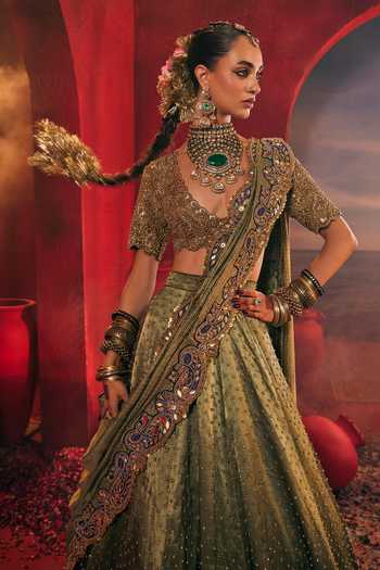 Payal & Zinal_Gold Silk, Chanderi Sweetheart Neck Shehzadi Paisley Embroidered Lehenga Set _Online_at_Aza_Fashions