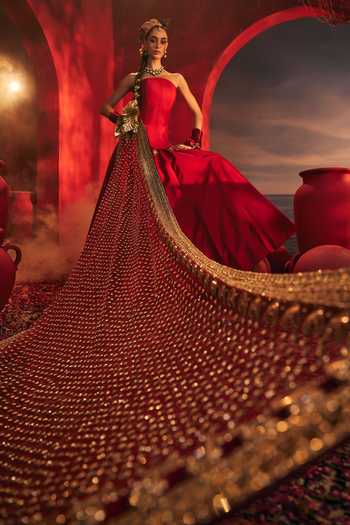 Payal & Zinal_Red Silk, Net, Velvet Embroidery Bandeau Neck Ananta Raw Corset Lehenga Set _at_Aza_Fashions