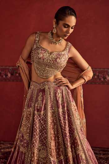 Ridhi Mehra_Gold Tissue, Net Sweetheart Neck Pichwai Embroidered Lehenga Set _Online_at_Aza_Fashions