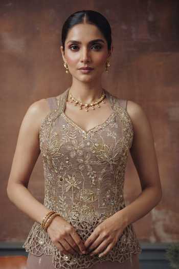 House Of Noori Purple Georgette Halter Neck Hand Embroidered Blouse And Sharara Set Online at Aza Fashions House Of Noori_Purple Georgette Halter Neck Hand Embroidered Blouse And Sharara Set _Online_at_Aza_Fashions