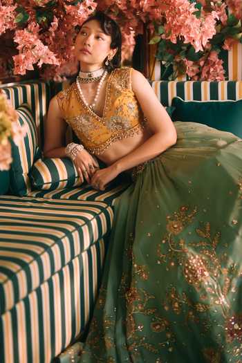 Paulmi And Harsh Green Organza, Satin, Lace V-neck Ciel Leaf Print Lehenga Set at Aza Fashions Paulmi And Harsh_Green Organza, Satin, Lace V-neck Ciel Leaf Print Lehenga Set _at_Aza_Fashions