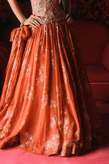 Paulmi And Harsh Orange Net, Organza Embroidery Bandeau Neck Delilah Print Lehenga Corset Set at Aza Fashions Paulmi And Harsh_Orange Net, Organza Embroidery Bandeau Neck Delilah Print Lehenga Corset Set _at_Aza_Fashions