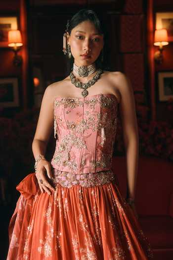 Shop Paulmi And Harsh Orange Net, Organza Embroidery Bandeau Neck Delilah Print Lehenga Corset Set Shop_Paulmi And Harsh_Orange Net, Organza Embroidery Bandeau Neck Delilah Print Lehenga Corset Set