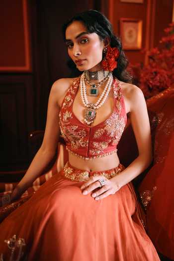 Shop Paulmi And Harsh Coral Organza Tassels Halter Neck Dreamlet Printed Lehenga Set Online at Aza Fashions Shop_Paulmi And Harsh_Coral Organza Tassels Halter Neck Dreamlet Printed Lehenga Set _Online_at_Aza_Fashions