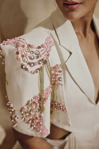 Buy_Babita M_Ivory Satin V-neck Nacre Sculpted-shoulder Embellished Jumpsuit _Online_at_Aza_Fashions