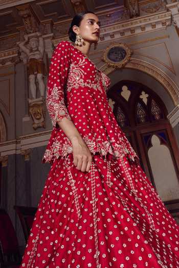 Shop_Anushree Reddy_Red Dupion Plunge Neck Athena Peplum Top And Lehenga Set _Online_at_Aza_Fashions
