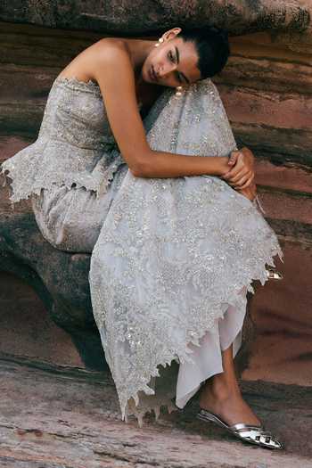 Anushree Reddy_Ivory Net Bandeau Neck Athena Peplum Top And Mermaid Skirt Set _Online_at_Aza_Fashions