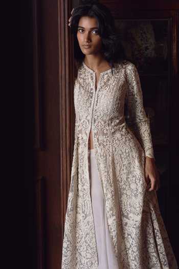 Anushree Reddy_Ivory Net, Raw Silk, Organza Split V-neck Carmine Embroidered Jacket Skirt Set _Online_at_Aza_Fashions