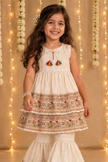 MI Dulce An'Ya Ivory Cotton, Chanderi Embroidered Top And Layered Sharara Set Online at Aza Fashions MI Dulce An'Ya_Ivory Cotton, Chanderi Embroidered Top And Layered Sharara Set _Online_at_Aza_Fashions