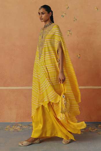 Pink City By Sarika_Yellow Silk Embroidery, Tassels V-neck Peela Leheriya Cape And Skirt Set _Online_at_Aza_Fashions