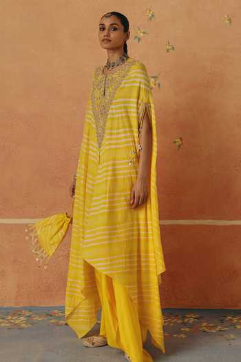 Buy_Pink City By Sarika_Yellow Silk Embroidery, Tassels V-neck Peela Leheriya Cape And Skirt Set _Online_at_Aza_Fashions