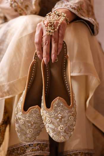 Shop_Coral Haze_Gold Malika Embroidered Open Back Juttis _Online_at_Aza_Fashions