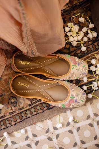 Shop Coral Haze Gold Ishrat Floral Hand Embroidered Juttis Online at Aza Fashions Shop_Coral Haze_Gold Ishrat Floral Hand Embroidered Juttis _Online_at_Aza_Fashions