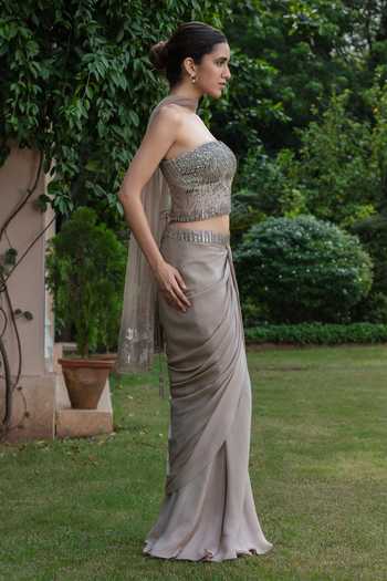 Buy Bohame Beige Crepe, Net Sequins, Stones Elara Embroidered Corset Draped Skirt Set Online at Aza Fashions Buy_Bohame_Beige Crepe, Net Sequins, Stones Elara Embroidered Corset Draped Skirt Set _Online_at_Aza_Fashions