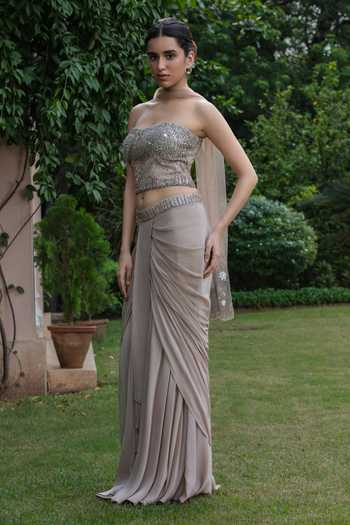Shop Bohame Beige Crepe, Net Sequins, Stones Elara Embroidered Corset Draped Skirt Set Online at Aza Fashions Shop_Bohame_Beige Crepe, Net Sequins, Stones Elara Embroidered Corset Draped Skirt Set _Online_at_Aza_Fashions