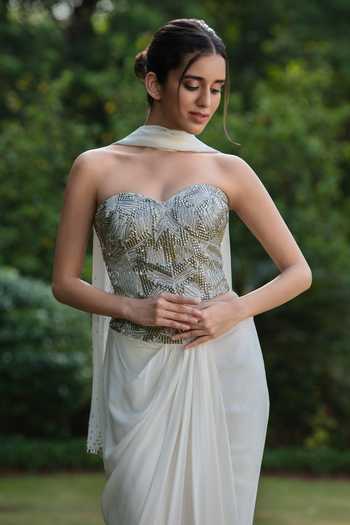 Buy_Bohame_Ivory Crepe Sequins, Beads Celestia Embroidered Corset Draped Skirt Set _Online_at_Aza_Fashions