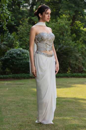 Shop_Bohame_Ivory Crepe Sequins, Beads Celestia Embroidered Corset Draped Skirt Set _Online_at_Aza_Fashions