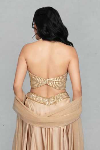 Bohame_Gold Satin, Net Halter Neck Leher Embroidered Blouse Lehenga Set _at_Aza_Fashions