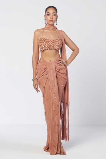 Rishi And Vibhuti_Peach Crepe Beads Halter Biscoff Crush Embroidered Bralette Draped Skirt Set _Online_at_Aza_Fashions