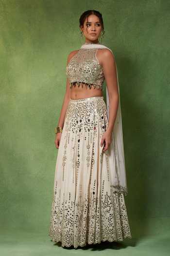 Shop Soniya G Ivory Georgette, Satin Halter Neck Noor-e-aaina Mirror Embroidered Lehenga Set Online at Aza Fashions Shop_Soniya G_Ivory Georgette, Satin Halter Neck Noor-e-aaina Mirror Embroidered Lehenga Set _Online_at_Aza_Fashions