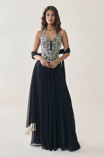 Seema Thukral Black Georgette, Satin Tassels Petal Embroidered Blouse Draped Skirt Set at Aza Fashions Seema Thukral_Black Georgette, Satin Tassels Petal Embroidered Blouse Draped Skirt Set _at_Aza_Fashions