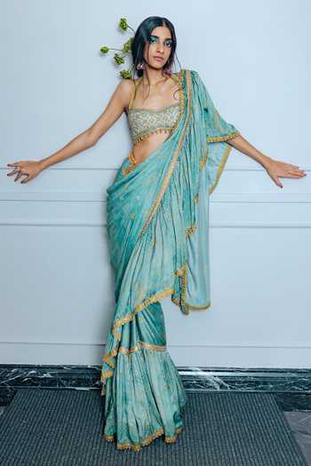 Punit Balana Green Silk, Satin Halter Neck Sage Pre-draped Saree With Embroidered Blouse at Aza Fashions Punit Balana_Green Silk, Satin Halter Neck Sage Pre-draped Saree With Embroidered Blouse _at_Aza_Fashions