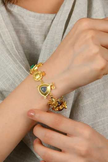 Totapari Gold Plated Sacred Flow Seven Chakra Bracelet Online at Aza Fashions Totapari_Gold Plated Sacred Flow Seven Chakra Bracelet _Online_at_Aza_Fashions