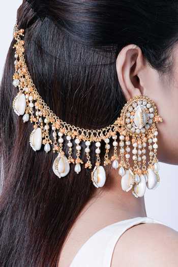 Vaidaan Gold Plated Aadarshini Seashell Earchain Earrings Online at Aza Fashions Vaidaan_Gold Plated Aadarshini Seashell Earchain Earrings _Online_at_Aza_Fashions