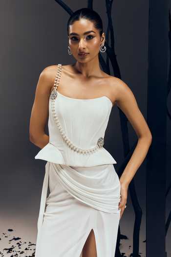 Buy Tisharth By Shivani White Polyester Pearls, Stones, Diamonds, Structured Corset With Draped Skirt Online at Aza Fashions Buy_Tisharth By Shivani_White Polyester Pearls, Stones, Diamonds, Structured Corset With Draped Skirt _Online_at_Aza_Fashions