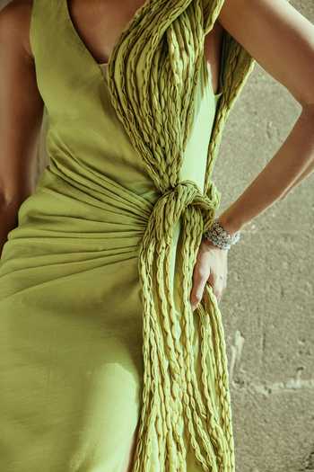 Supria Munjal Olive Green Organza Tassels Asymmetric Neck Entwined Draped Gown at Aza Fashions Supria Munjal_Olive Green Organza Tassels Asymmetric Neck Entwined Draped Gown _at_Aza_Fashions