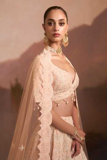 Angad Singh Peach Raw Silk Sweetheart Neck Pehli Kiran Lehenga Set Online at Aza Fashions Angad Singh_Peach Raw Silk Sweetheart Neck Pehli Kiran Lehenga Set _Online_at_Aza_Fashions
