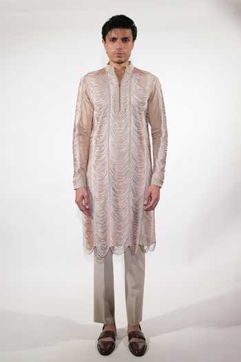 Shop Jubinav Chadha Beige Suede, Cotton, Lycra Fringed Kurta Set Online at Aza Fashions Shop_Jubinav Chadha_Beige Suede, Cotton, Lycra Fringed Kurta Set _Online_at_Aza_Fashions
