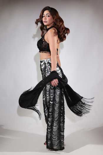 Shop Jubinav Chadha Black Georgette, Net Halter Neck Sequin Work Blouse Fringed Skirt Set Online at Aza Fashions Shop_Jubinav Chadha_Black Georgette, Net Halter Neck Sequin Work Blouse Fringed Skirt Set _Online_at_Aza_Fashions
