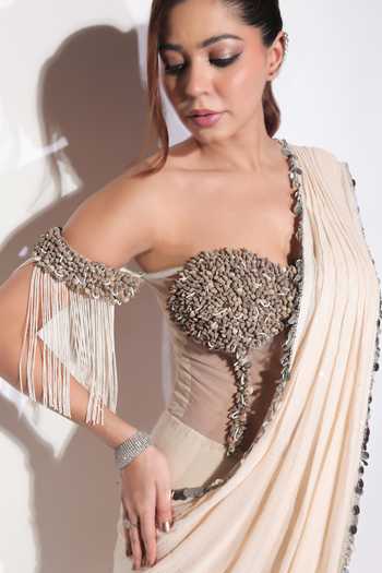Jubinav Chadha Off White Georgette, Net Embroidery, Tassels, Sequin Draped Saree With Corset at Aza Fashions Jubinav Chadha_Off White Georgette, Net Embroidery, Tassels, Sequin Draped Saree With Corset _at_Aza_Fashions