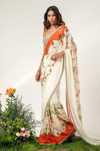 Shwetanga Ivory Organza, Crepe Tassels, Lace Garden And Draped Saree With Corset at Aza Fashions Shwetanga_Ivory Organza, Crepe Tassels, Lace Garden And Draped Saree With Corset _at_Aza_Fashions