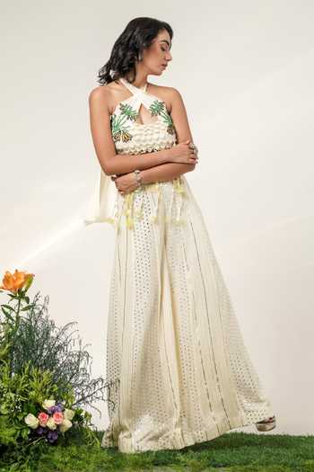 Shwetanga Ivory Cotton, Organza, Georgette Halter Neck, Botanical Tassel Top And Sharara Set at Aza Fashions Shwetanga_Ivory Cotton, Organza, Georgette Halter Neck, Botanical Tassel Top And Sharara Set _at_Aza_Fashions