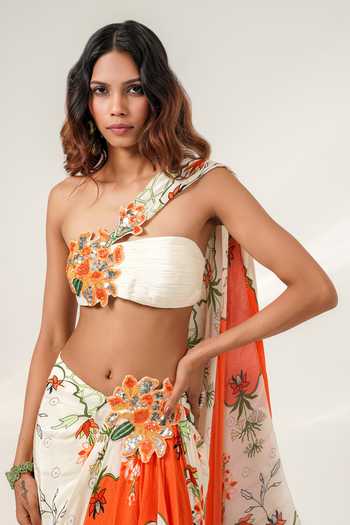 Shwetanga Ivory Crepe One Shoulder Apsara Printed Draped Skirt And Bustier Set at Aza Fashions Shwetanga_Ivory Crepe One Shoulder Apsara Printed Draped Skirt And Bustier Set _at_Aza_Fashions