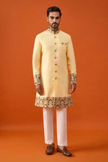 Shop_Arihant Rai Sinha_Yellow Silk, Viscose, Polyester Placed Floral Pattern Sherwani Set _Online_at_Aza_Fashions