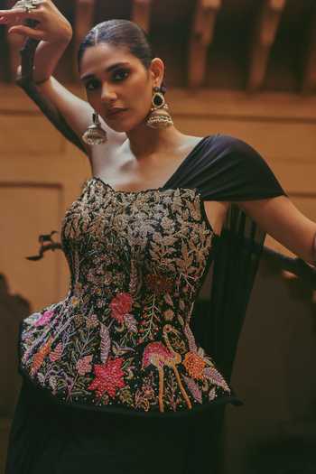 Shop Label Moni K Black Organza, Lycra Embroidery One Mahira Draped Saree With Peplum Top Online at Aza Fashions Shop_Label Moni K_Black Organza, Lycra Embroidery One Mahira Draped Saree With Peplum Top _Online_at_Aza_Fashions